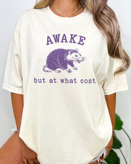 Awake But At What Cost Shirt in natural color with a funny opossum graphic