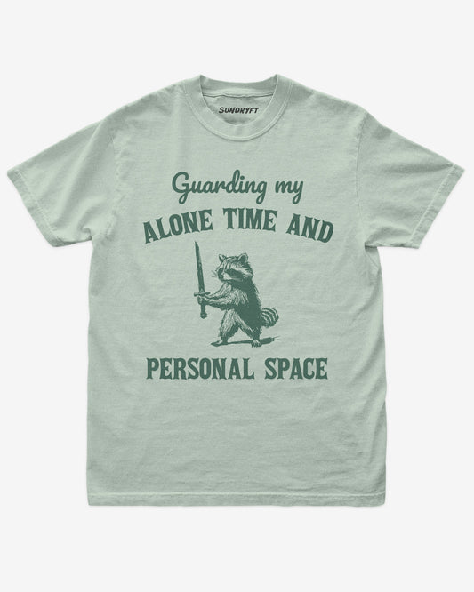 Bay “Guarding My Alone Time And Personal Space” funny introvert shirt flat lay.