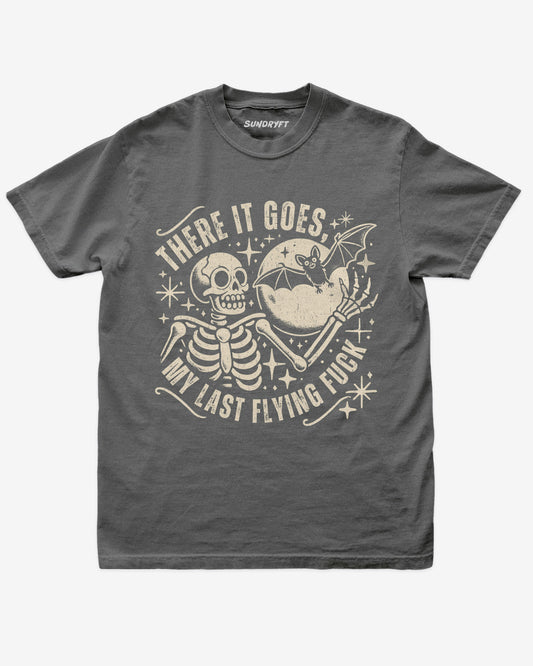 There It Goes My Last Flying Fuck shirt in pepper with retro graphic of skeleton and bat