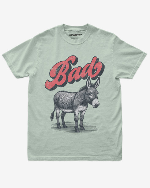 Bay “Badass Donkey” funny pun retro graphic shirt flat lay.
