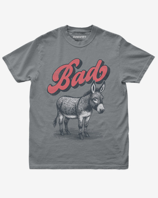 Granite “Badass Donkey” funny pun retro graphic shirt flat lay.