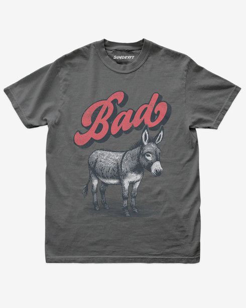 Pepper “Badass Donkey” funny pun retro graphic shirt flat lay.