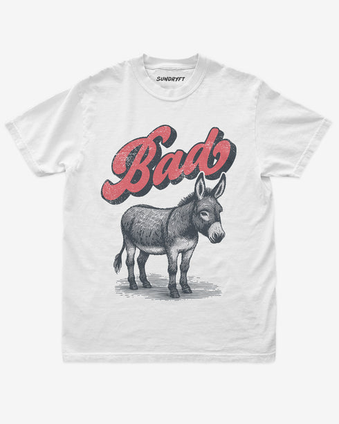 White “Badass Donkey” funny pun retro graphic shirt flat lay.
