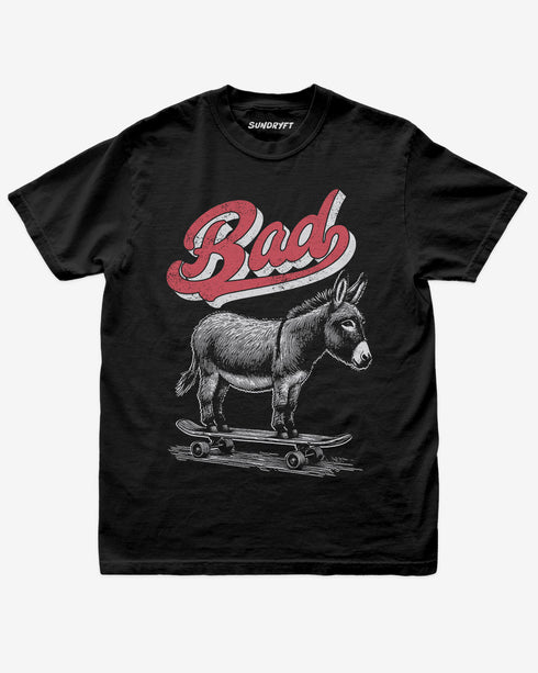 Black “Badass Donkey On Skateboard” funny retro skate pun shirt flat lay.