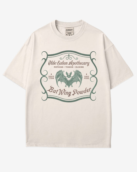 Vintage Salem apothecary graphic tee in ivory with bat wing powder potion design