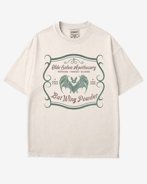 Vintage Salem apothecary graphic tee in ivory with bat wing powder potion design