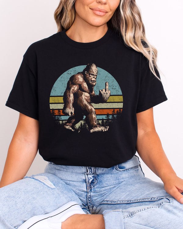 Model wearing black color shirt with 'Bigfoot Showing Middle Finger' graphic design