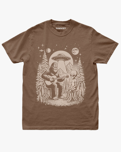 Bigfoot Playing Guitar With Alien And UFO Shirt on espresso brown tee with funny forest UFO design