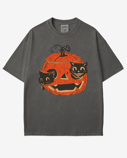 pepper-colored Black Cats in Pumpkin Shirt โ retro graphic tee with two black cats inside a carved Halloween pumpkin
