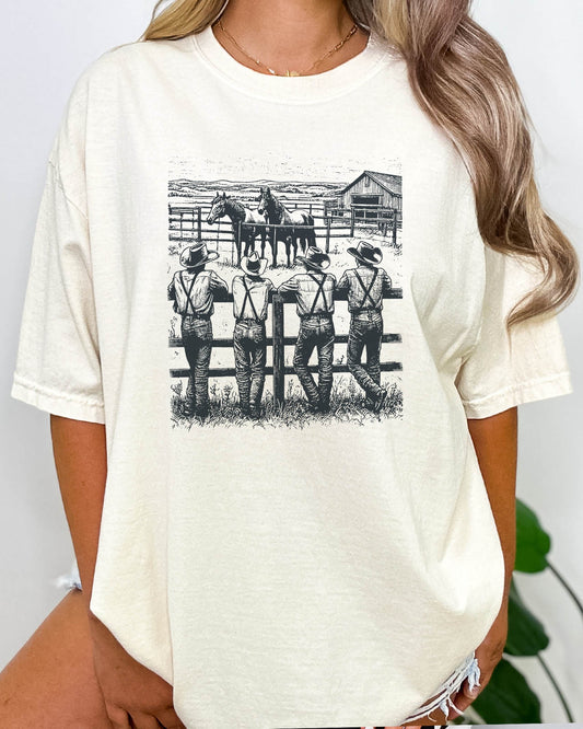 Woman wearing retro graphic cowboy gang shirt in natural beige color