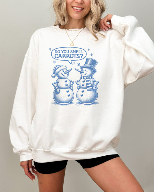 Model wearing white color sweatshirt with 'Do You Smell carrots?' snowmen conversation graphic design