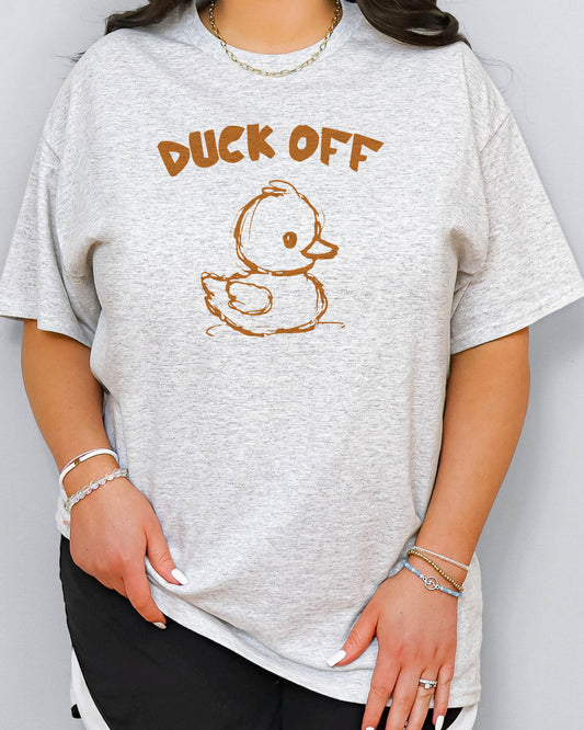 Woman wearing funny "Duck Off" shirt in ash gray color with a retro duck graphic