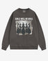 Flat lay pepper 'Girls Will Be Girls' sweatshirt with retro graphic of witches holding hands in a Halloween ritual.