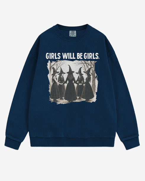 Flat lay true navy 'Girls Will Be Girls' sweatshirt with retro graphic of witches holding hands in a Halloween ritual.