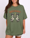 Model wearing military green color shirt with 'Goosebumps' funny Halloween graphic design