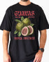 Man wearing a black "Guavas – Tropical Sweetness" shirt with a retro graphic of guava fruits.