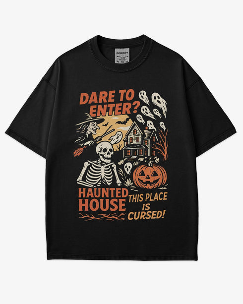 Flat lay black "Dare To Enter? - Haunted House" shirt with a retro Halloween graphic of a haunted house, witch, skeletons, and ghosts.
