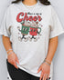 Woman wearing a retro Christmas coffee graphic shirt in ash grey color with the quote "Have A Cup of Cheer"