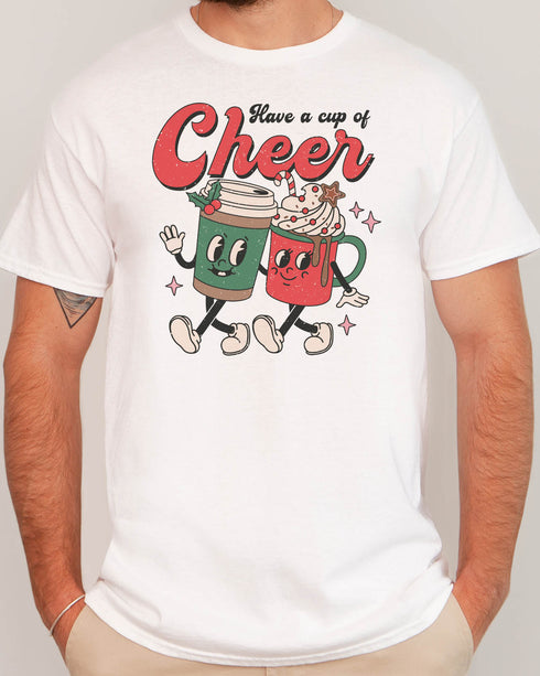 Man wearing a retro Christmas coffee graphic shirt in white color with the quote "Have A Cup of Cheer"