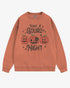 Flat lay terracotta ‘Have A Gourd Night’ sweatshirt with retro pumpkins and black cat graphic.