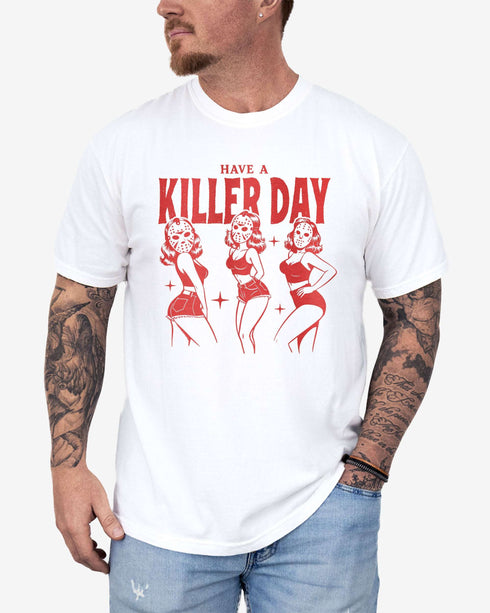 Man wearing a white “Have A Killer Day” shirt with a funny Halloween graphic of bikini girls in hockey masks.