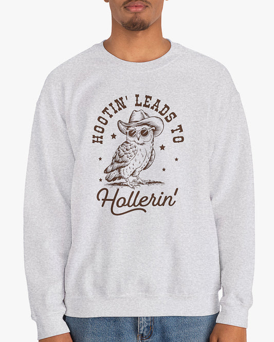 Man wearing ash gray 'Hootin Leads To Hollerin' sweatshirt with funny retro owl graphic