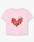 Howdy graphic women's baby tee in light pink lying flat