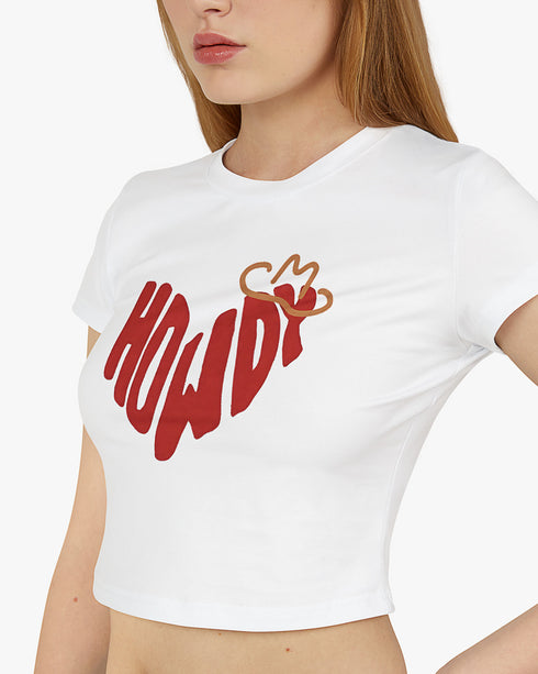 Close side View of woman wearing the Howdy graphic baby tee in white color