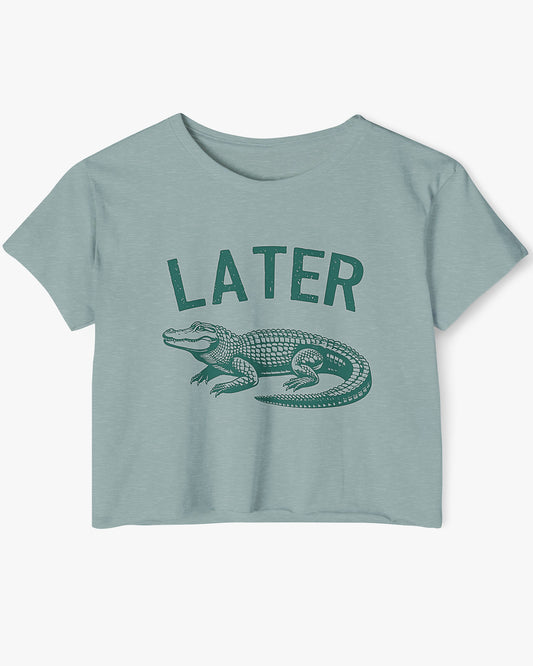 Flat lay stonewash-green-colored 'Later Gator' crop top featuring a funny retro alligator graphic.