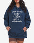 Woman wearing true navy 'Live Laugh Lobotomy' hoodies with funny retro graphic of armor flying on a rocket.