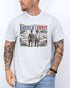 Model wearing ash color shirt with 'Make America Cowboy Again' graphic design