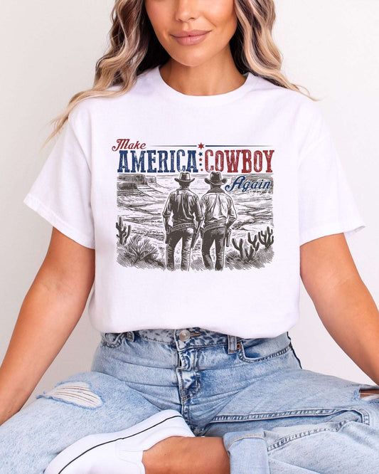 Model wearing white color shirt with 'Make America Cowboy Again' graphic design