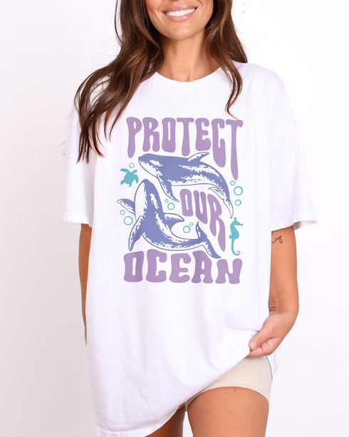 Model wearing white color shirt with 'Protect Our Ocean' retro graphic design