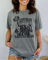 Model wearing gray color shirt with 'Sleepy Hollow Dead And Breakfast - The Place To Rest A Weary Head' graphic design