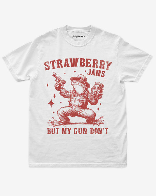 Strawberry Jams But My Gun Don't shirt in white with funny frog holding a jar of strawberry jam and a gun graphic