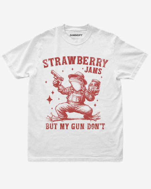 Strawberry Jams But My Gun Don't shirt in white with funny frog holding a jar of strawberry jam and a gun graphic