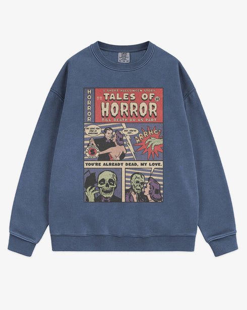 Flat lay denim 'Tales of Horror' sweatshirt with retro comic-style Halloween graphic of a spooky love story.