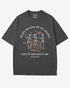 They’re Burning All The Witches Shirt – flat lay graphite tee with funny retro skeletons dancing in fire graphic