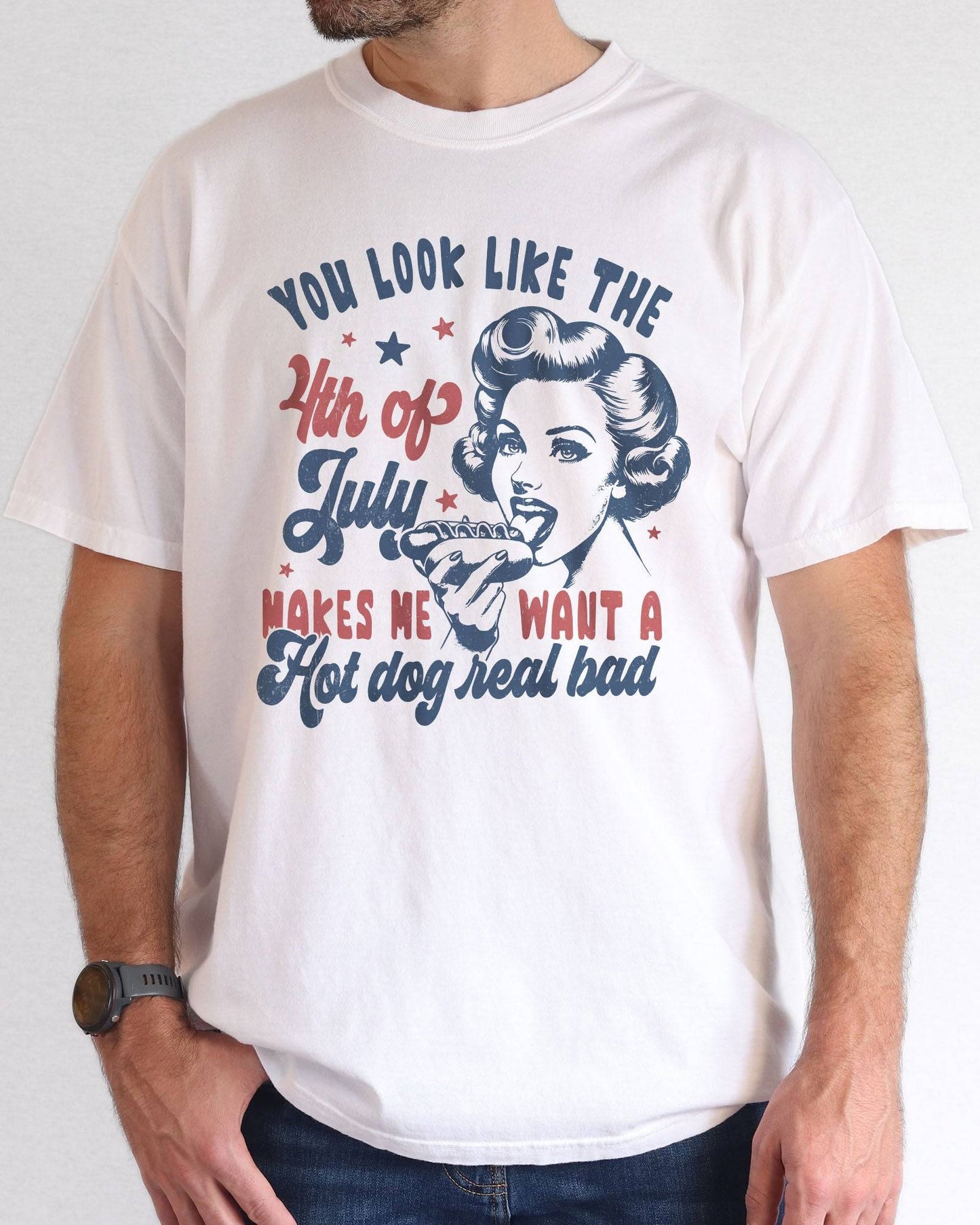 Model wearing white color shirt with 'You Look Like The 4th Of July' graphic design