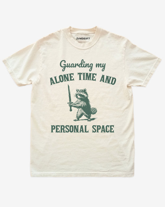 Ivory “Guarding My Alone Time And Personal Space” funny introvert shirt flat lay.