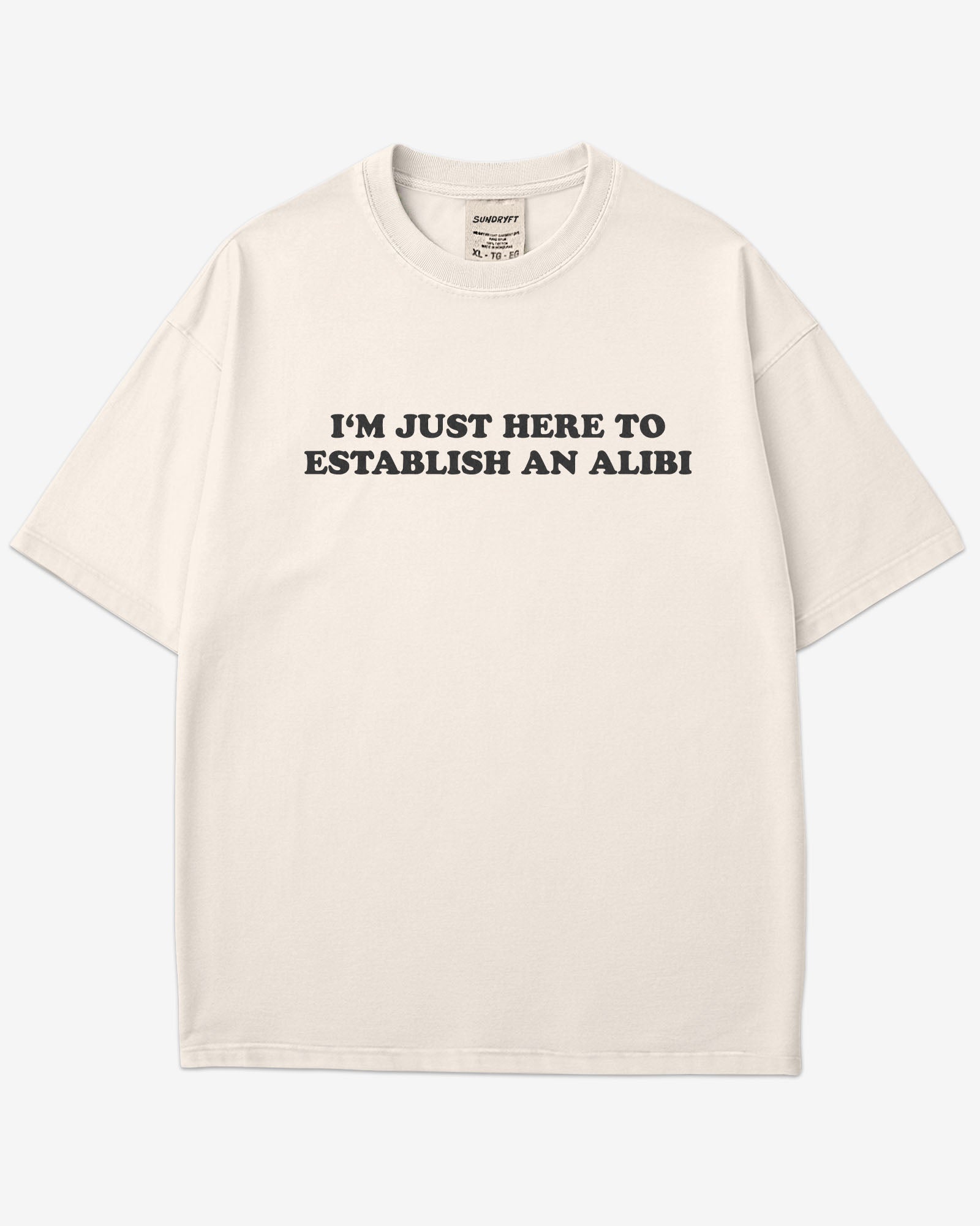 Flat lay ivory I'm Just Here To Establish An Alibi shirt.