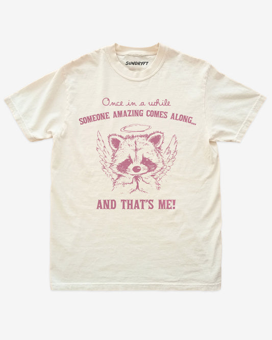 Ivory “Every Once In A While Someone Amazing Comes Along And That’s Me” funny confidence shirt flat lay.
