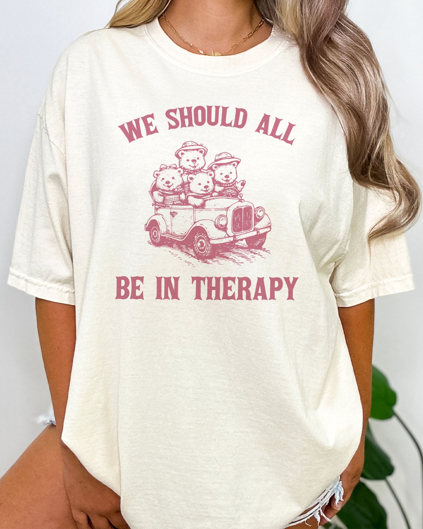 Funny therapy shirt in natural color with the quote "We should all be in therapy"