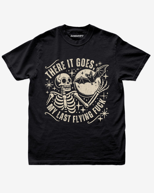 There It Goes My Last Flying Fuck shirt in black with retro graphic of skeleton and bat