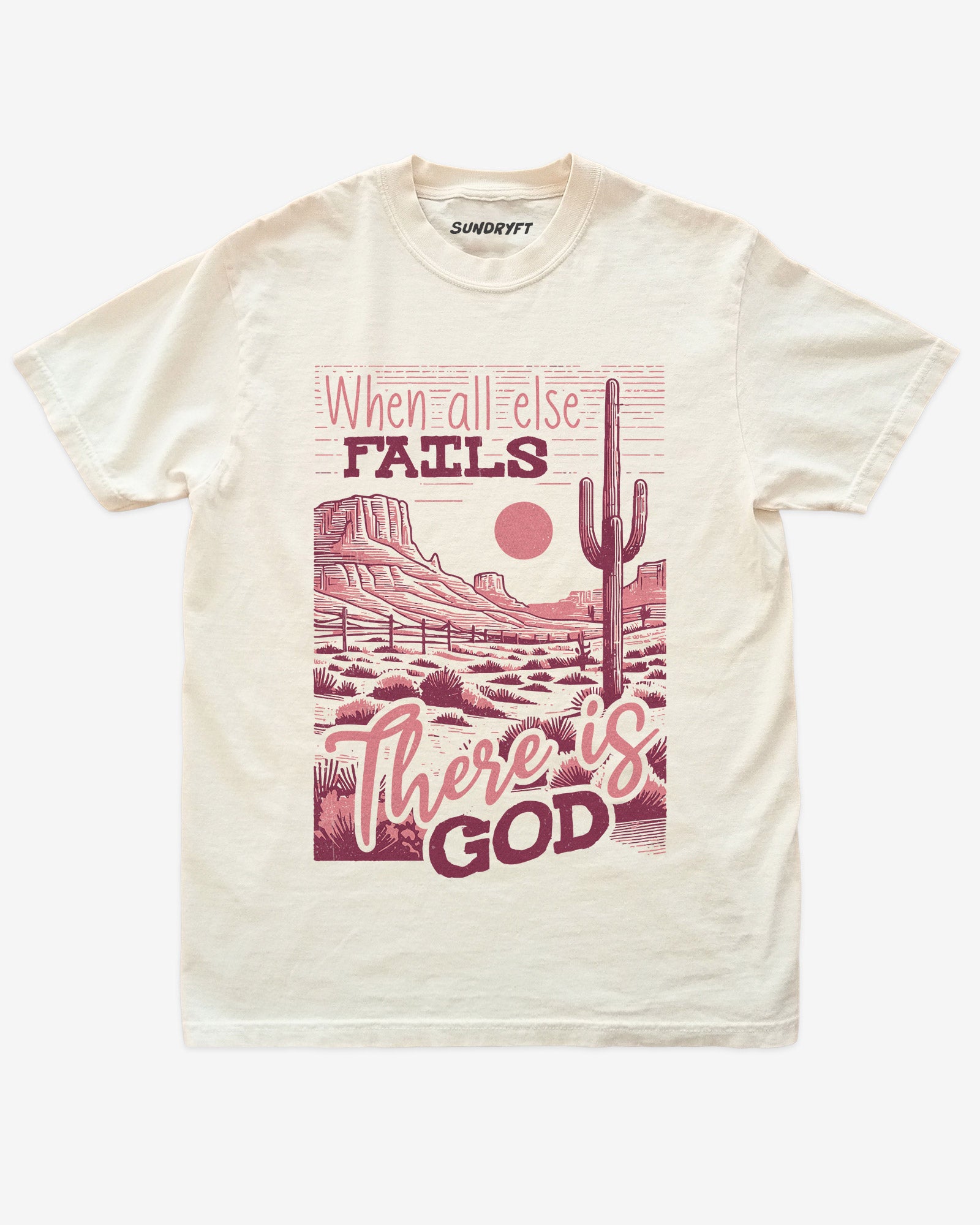 When All Else Fails There Is God shirt in ivory with retro graphic of western desert scenery