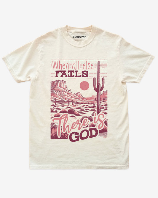 When All Else Fails There Is God shirt in ivory with retro graphic of western desert scenery