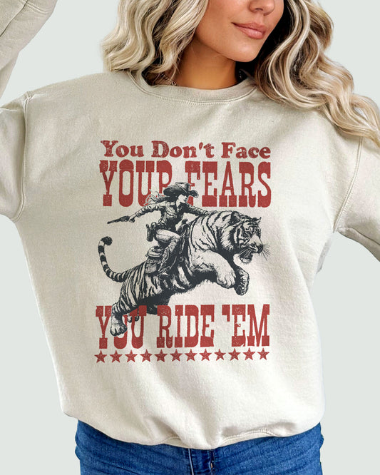 You Don't Face Your Fears You Ride Them Sweatshirt sandy beige with retro cowgirl graphic