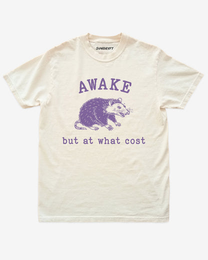 Awake But At What Cost shirt in ivory with funny retro opossum graphic