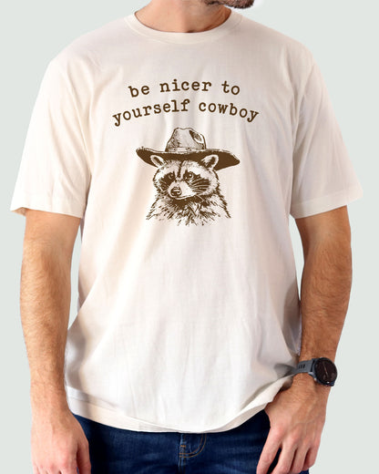 Be Nicer To Yourself Cowboy Shirt in natural color with retro cowboy raccoon graphic