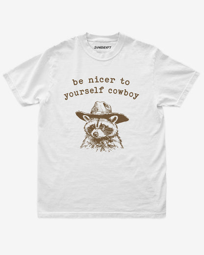 Be Nicer To Yourself Cowboy shirt in white with cowboy raccoon graphic